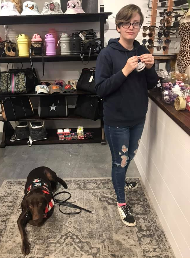 Gracie and her dog Amos with a link to the Resources page